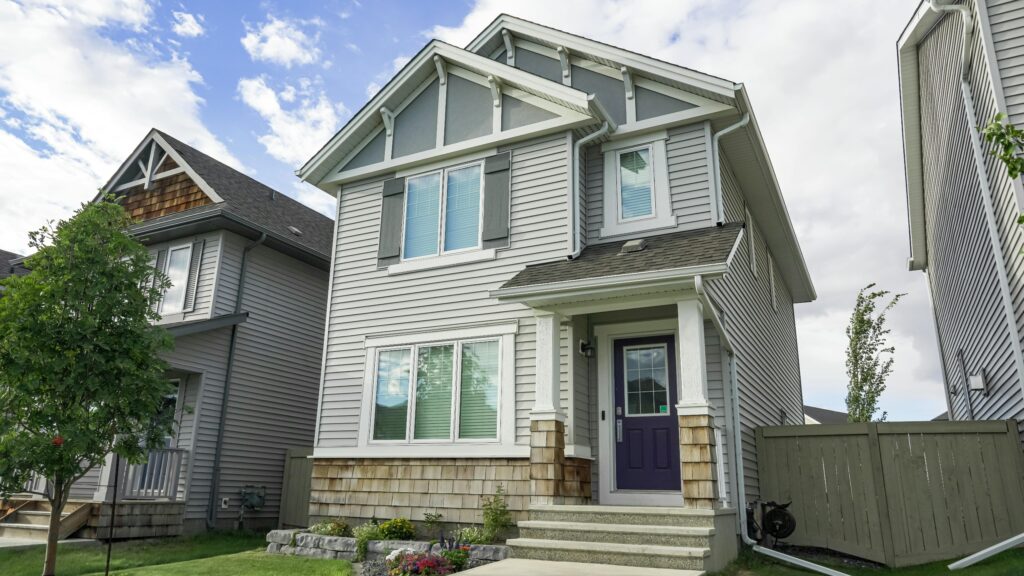 Emred Luxury Villa Contemporary suburban home with a front porch and clear blue sky, ideal for real estate themes.
